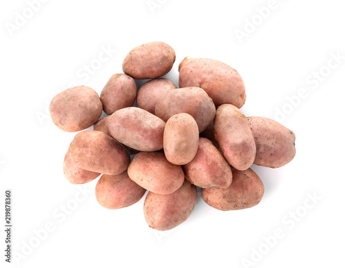 Fresh ripe organic potatoes on white background, top view