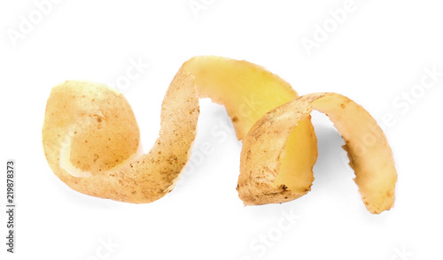 Potato peel on white background. Food waste