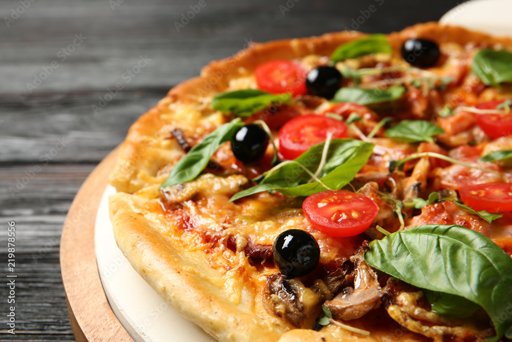 Tasty fresh homemade pizza on table, closeup Tasty fresh homemade pizza on table, closeup