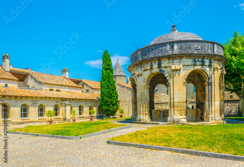 Main courtyard with a pavilion in the old carthusian monastery Chartreuse de Villeneuve lez Avignon, France photo