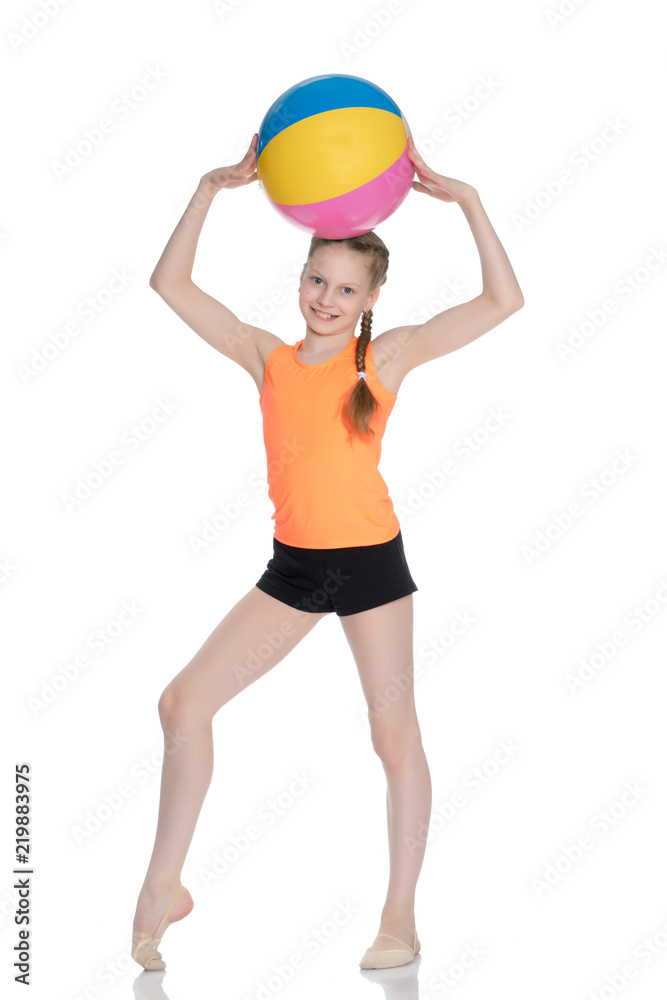 The gymnast prepares to perform the exercise. The gymnast prepares to perform the exercise.