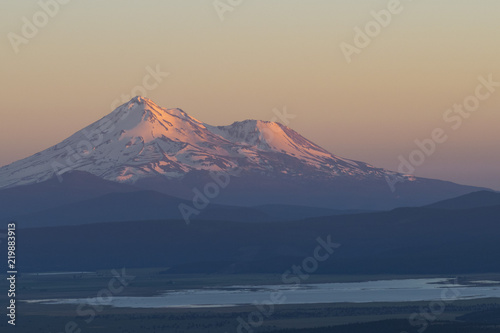 Mount shasta in a hazy sunset