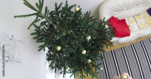 Decorating christmas tree in time lapse