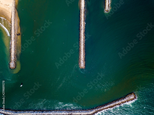 Overhead view of different ocean jetties in a cluster