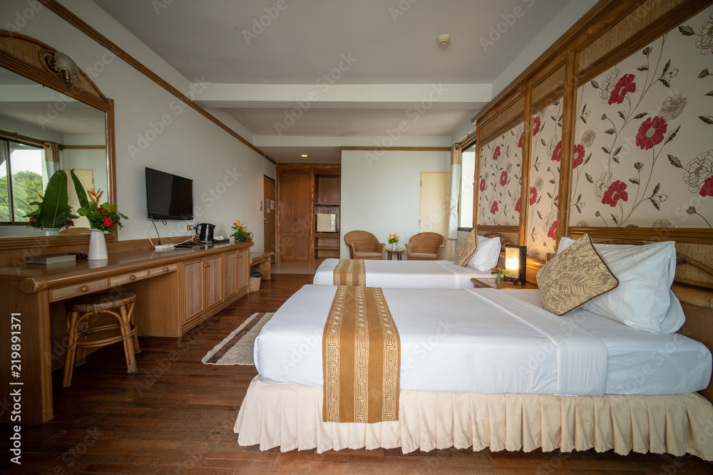 interia perspective of twin hotel bedroom with two twin beds for two persons at Samed Cabana Samed island Rayong district Thailand