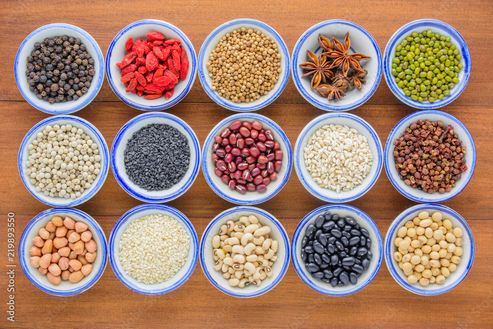 Various kinds of beans and grains ,different kinds of beans and grains in bowl on wooden table. Various kinds of beans and grains ,different kinds of beans and grains in bowl on wooden table.