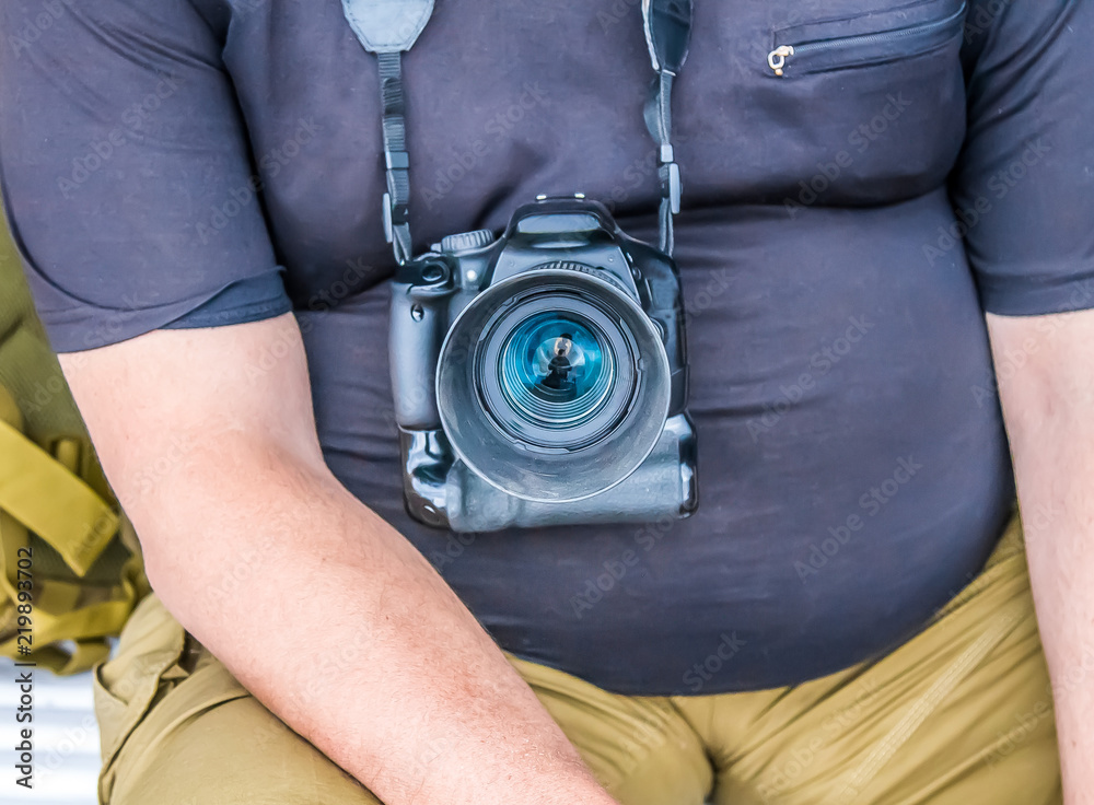 Camera on the belly of the photographer