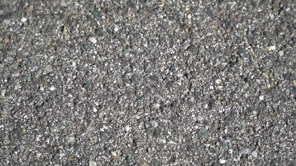 Close-up asphalt road texture with selective focus. Close-up asphalt road texture with selective focus.