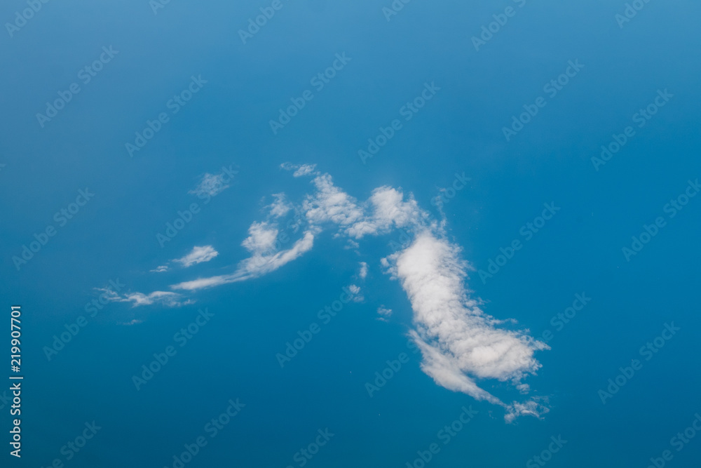 View from above the clouds and the sea View from above the clouds and the sea