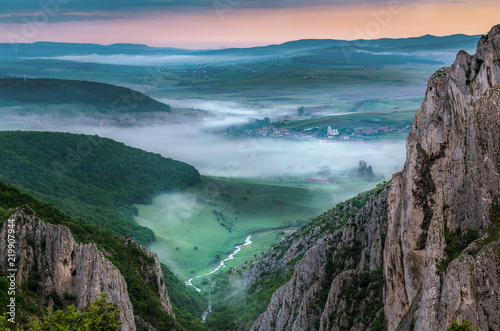 View from Turda Gorges, a natural reserve near Cluj county, Transylvania. Fog and mist in morning lights.