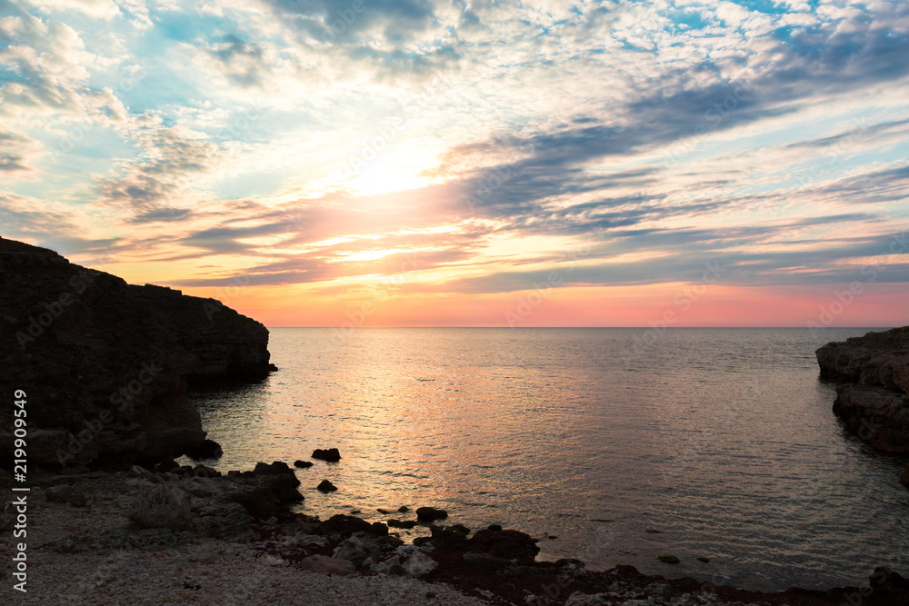 Brilliant vacation destination beach sunrise and sea cliffs background