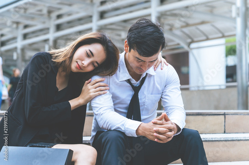 Girlfriend is forgive and hugging an upset boyfriend outdoor photo