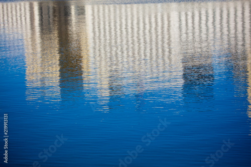 Reflection of a building on the surface of water