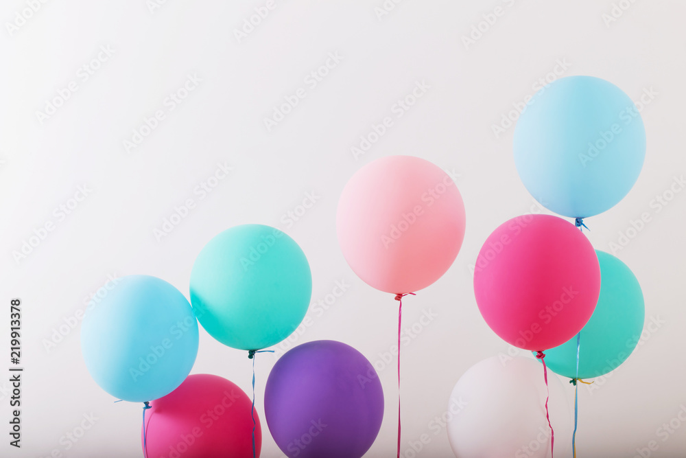 balloons on white wooden background balloons on white wooden background
