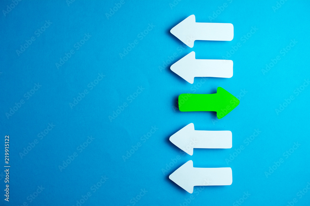 white arrows on a blue background. leadership purposefulness self-development concept white arrows on a blue background. leadership purposefulness self-development concept