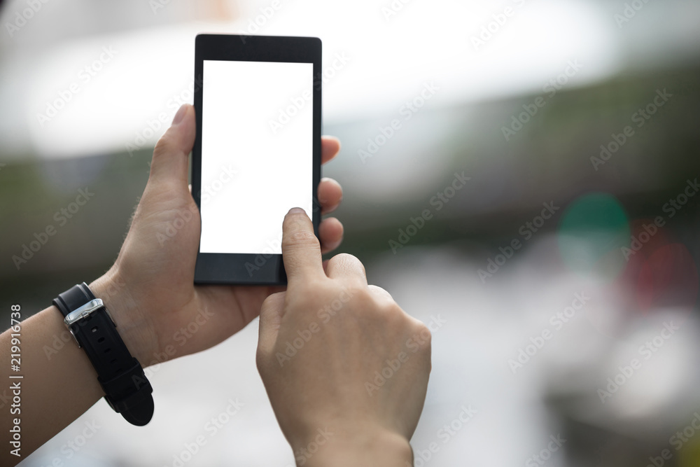 Hands hold smartphone take pictures in modern city Hands hold smartphone take pictures in modern city