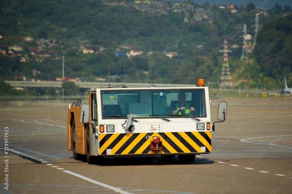 Tractor tow at the airport