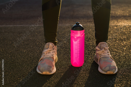running shoes and bottle of water. Healthy lifestyle and sport concept