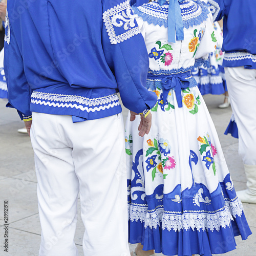 Couple of dancers wearing one of the folk costume of Altai Republic, Russia