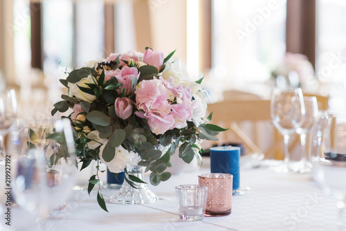 Bouquet of flowers on a wedding table. A beautiful wedding decor