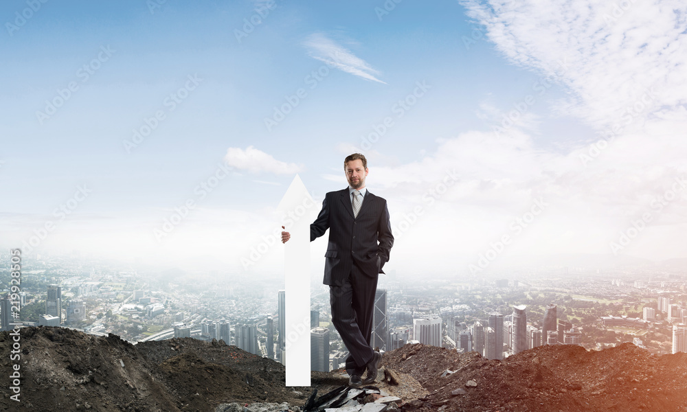 Business conceptual image of businessman in ruins