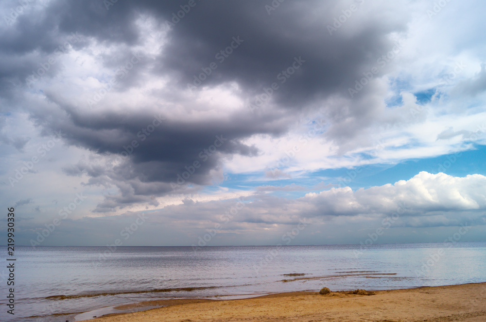 Gloomy blue gray sky and clouds over Lake Ladoga