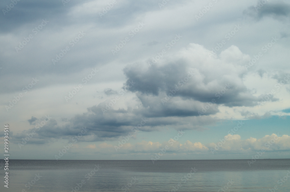 Gloomy blue gray sky and clouds over Lake Ladoga