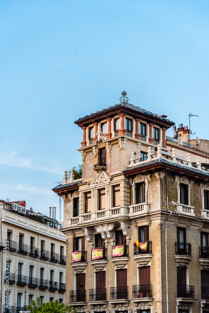 Colorful old buildings in historic city centre of Madrid