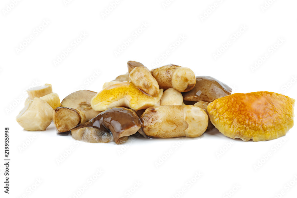 Pile of marinated birch bolete mushrooms isolated on a white background