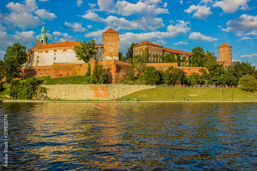 medieval castle historical place on river shore in summer colorful contrast day time