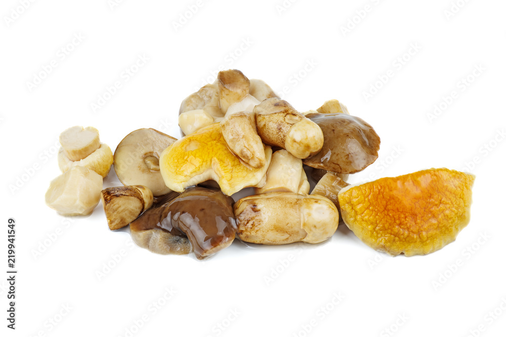 Pile of marinated birch bolete mushrooms isolated on a white background Pile of marinated birch bolete mushrooms isolated on a white background