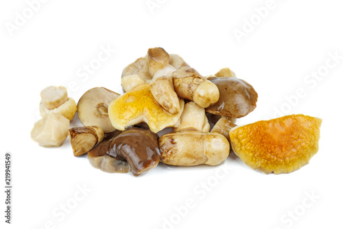Pile of marinated birch bolete mushrooms isolated on a white background