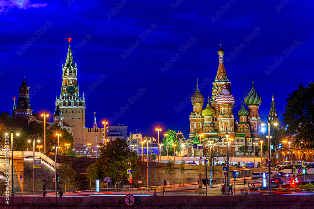 Spasskaya Tower, Moscow Kremlin and Saint Basil s Cathedral at night in Moscow, Russia. Architecture and landmarks of Moscow. Postcard of Moscow Spasskaya Tower, Moscow Kremlin and Saint Basil s Cathedral at night in Moscow, Russia. Architecture and landmarks of Moscow. Postcard of Moscow