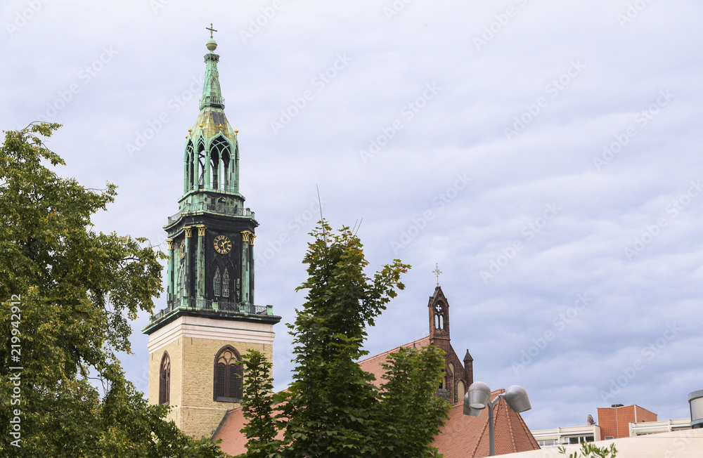 St. Mary's Church (Marienkirche) in Mitte district of Berlin, the capital city of germany, copy space in the sky with clouds