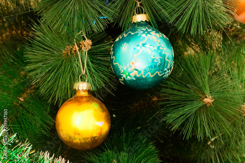 Photos Toys balls on a Christmas tree.