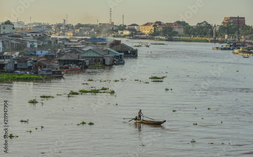 Mekong River with floating village photo