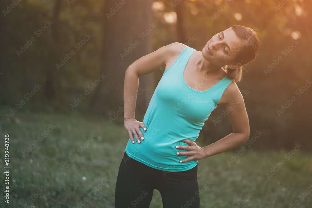 Beautiful woman enjoys exercising in the nature. Beautiful woman enjoys exercising in the nature.