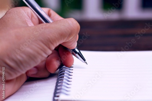 Hand Writing On notebook