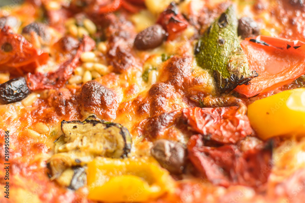 Vegetarian Pizza J Shadow Depth of Field Close up Food Photography; Pizza with Pepper, Courgette, Olives and Pesto Vegetarian Pizza J Shadow Depth of Field Close up Food Photography; Pizza with Pepper, Courgette, Olives and Pesto