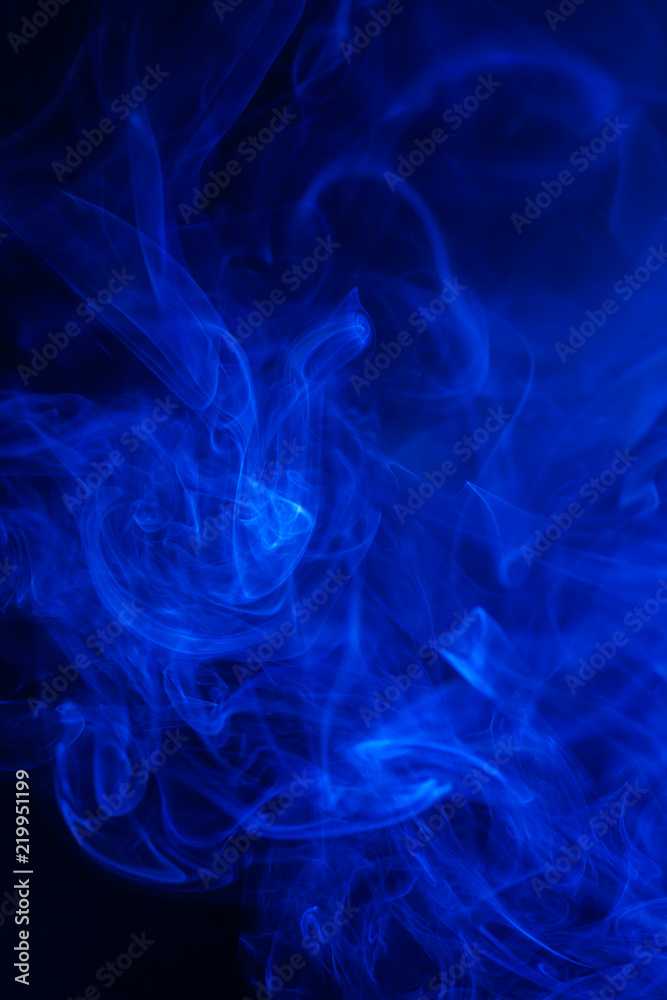 Blue smoke on black background. Blue smoke on black background.