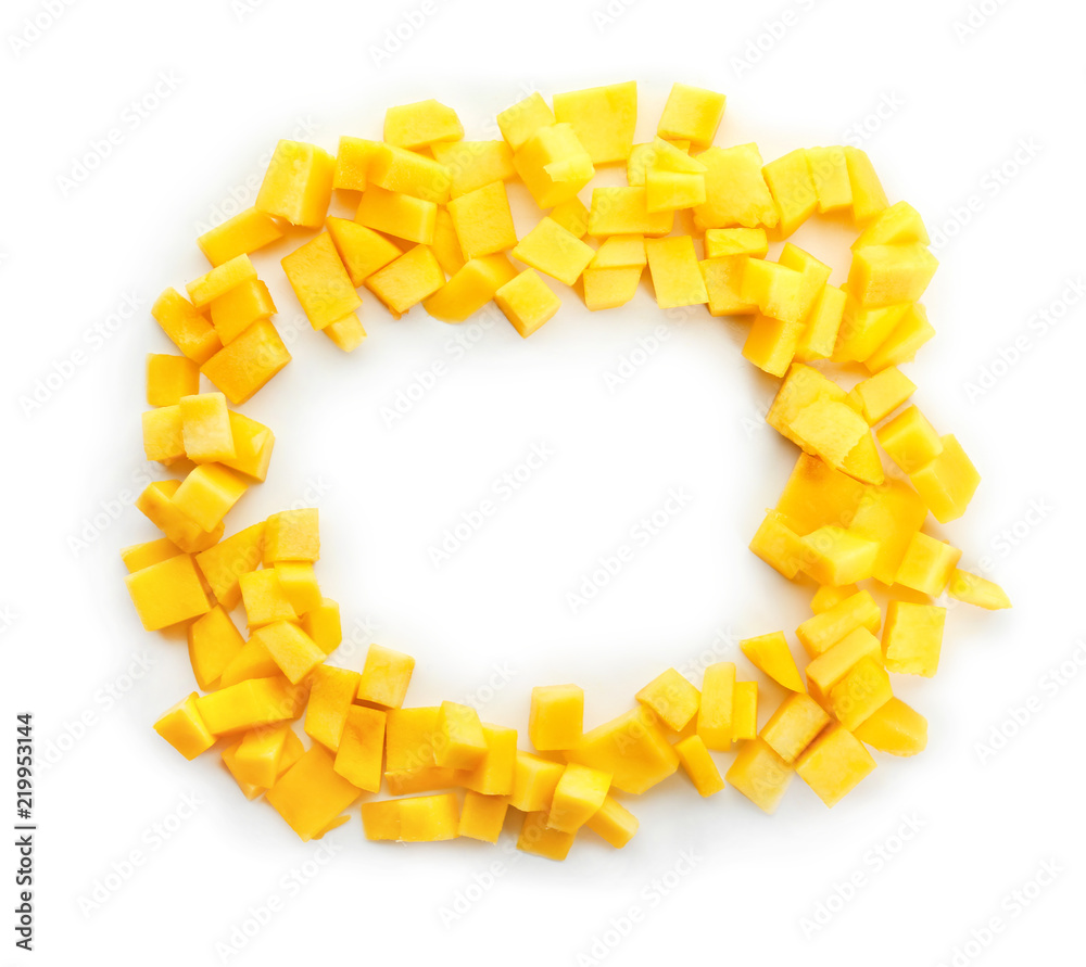 Round frame made of mango pieces on white background