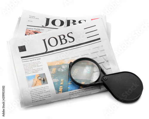 Magnifying glass with newsp...