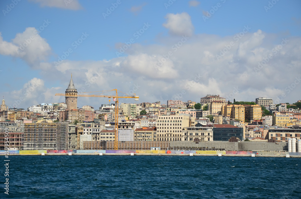 Istanbul, Turkey - MAY 12, 2018: City skyline view from ferry sail. 