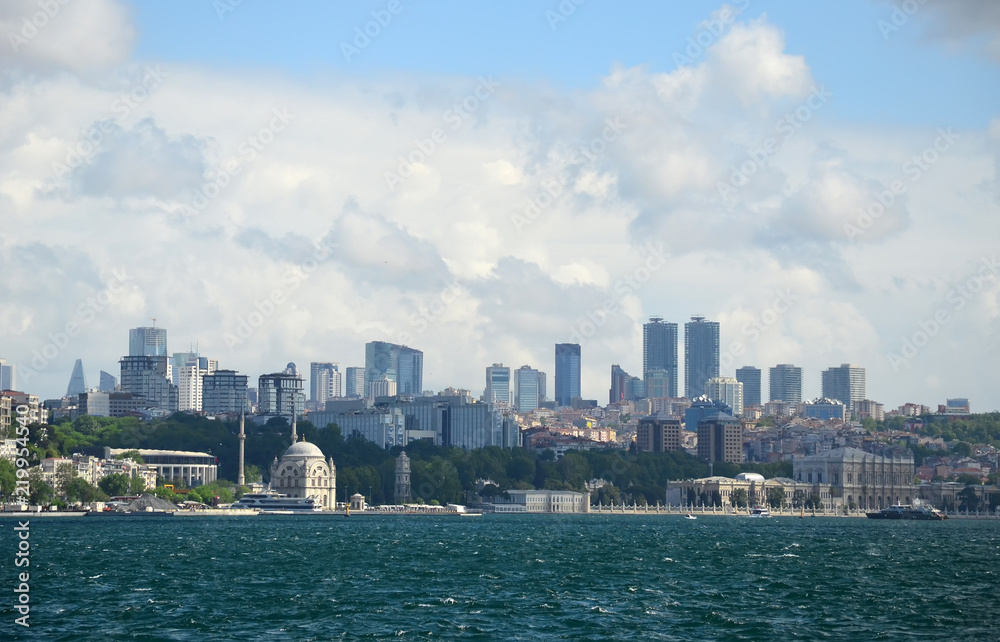 View from the sea cityscape with modern skyscrapers in business center of Istanbul