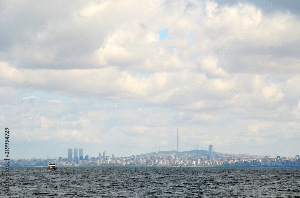 Beautiful Istanbul skyline with white clouds and blue sky. View from Prince Islands