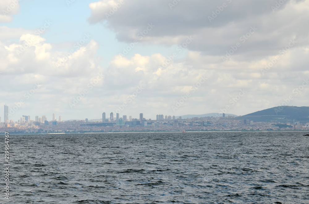 Beautiful Istanbul skyline with white clouds and blue sky. View from Prince Islands