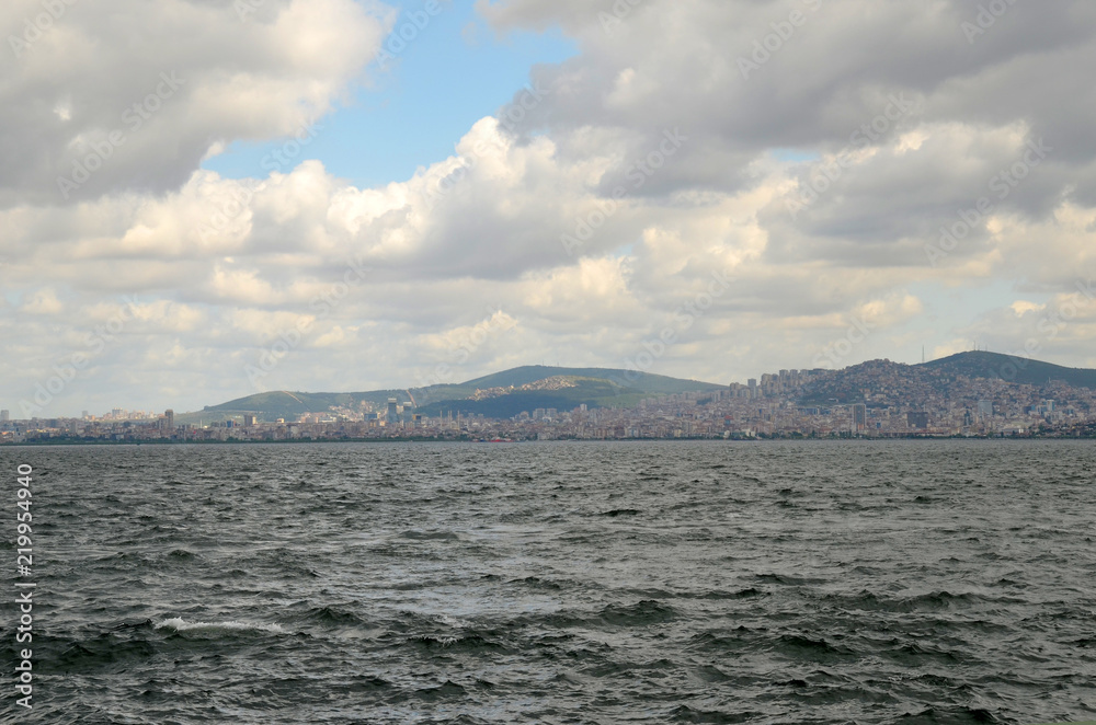 Beautiful Istanbul skyline with white clouds and blue sky. View from Prince Islands