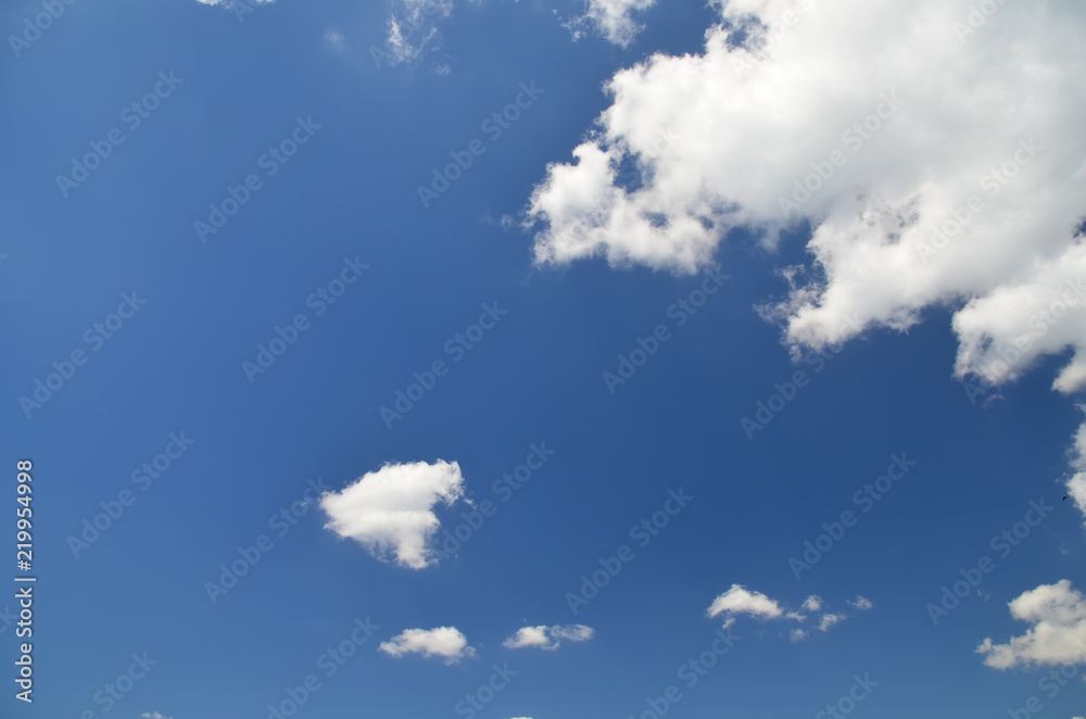 Blue sky with white clouds. Texture/Background Blue sky with white clouds. Texture/Background