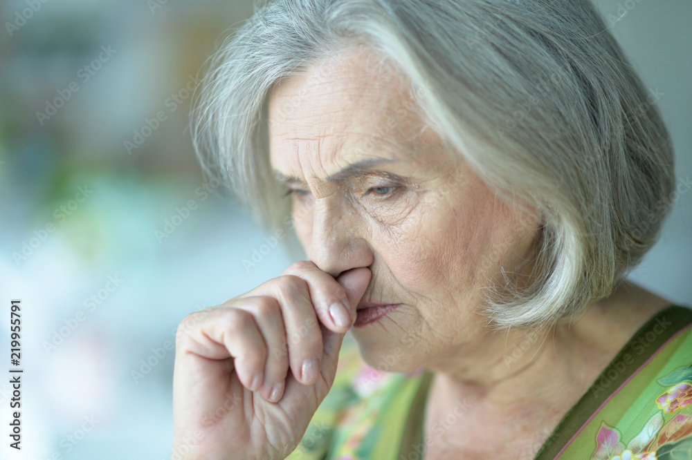 Close up portrait of tired senior woman Close up portrait of tired senior woman