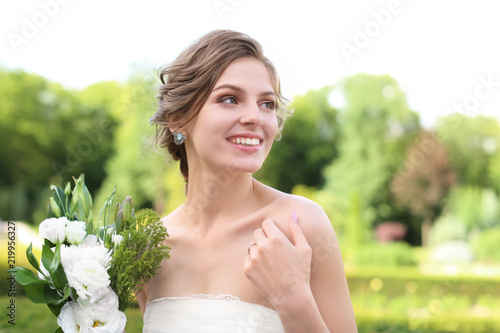 Beautiful young bride with ...